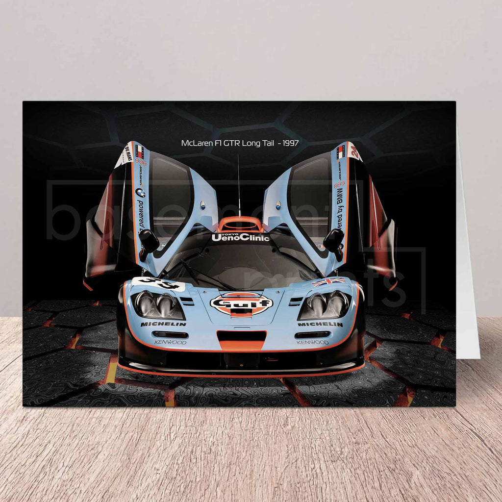 Greeting card of a McLaren F1 GTR Gulf racing car on a white background.