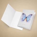 Greeting card with a blue butterfly illustration on a beige background
