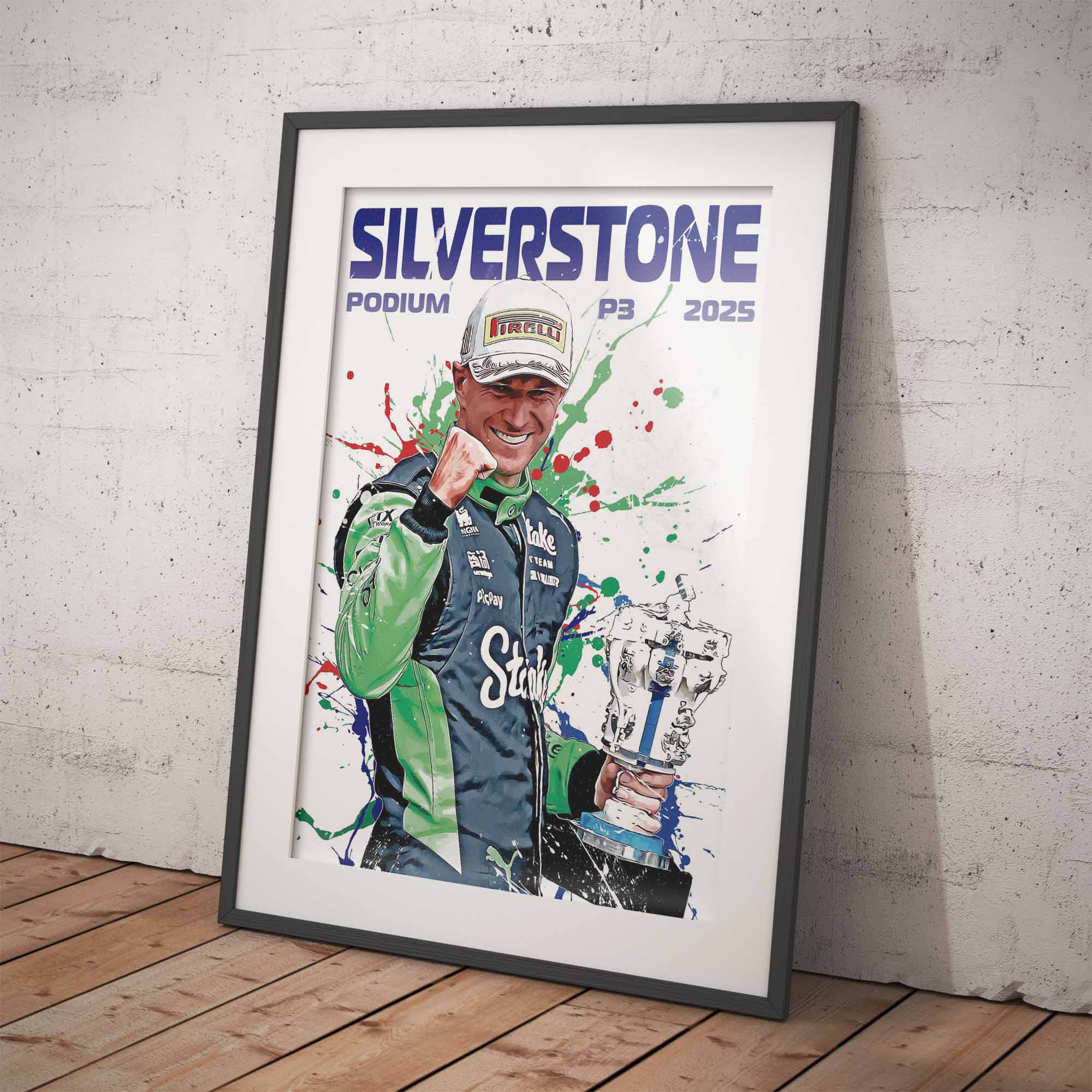 Framed poster of Nico Hulkenberg celebrating with a trophy at Silverstone, 2025.