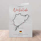 Map of Nordschleife at Nürburgring with text on a textured paper background