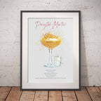 Framed Pornstar Martini cocktail recipe print for a 'Pernod Martini' against a brick wall.