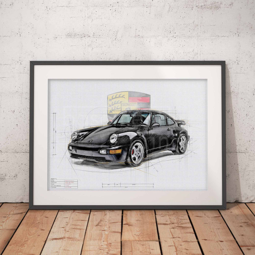 Framed artwork of a black Porsche 911 964 sports car on a white background, leaning against a textured wall.