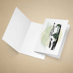 Greeting card of a Porsche 911 GT3 RS with a green circle on a beige background.