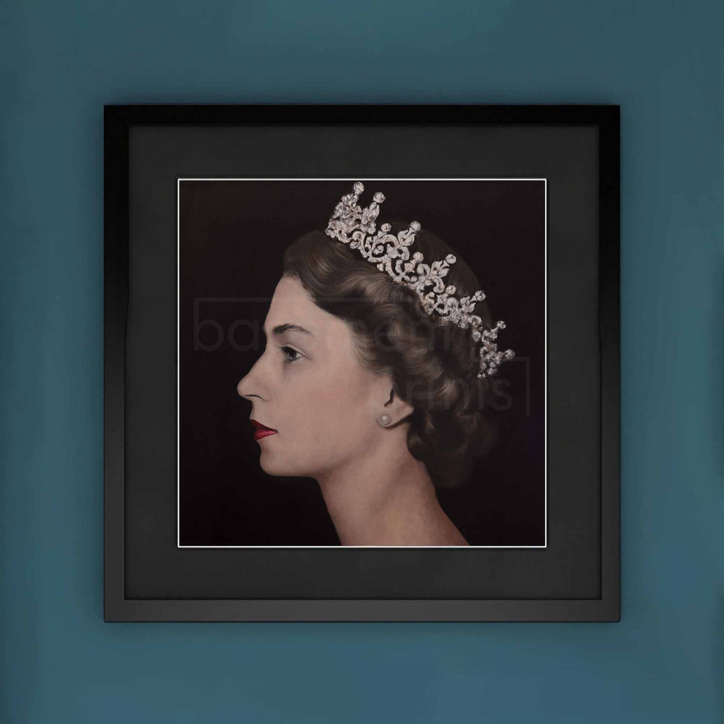 Framed portrait of a Queen Elizabeth II wearing a tiara on a dark background