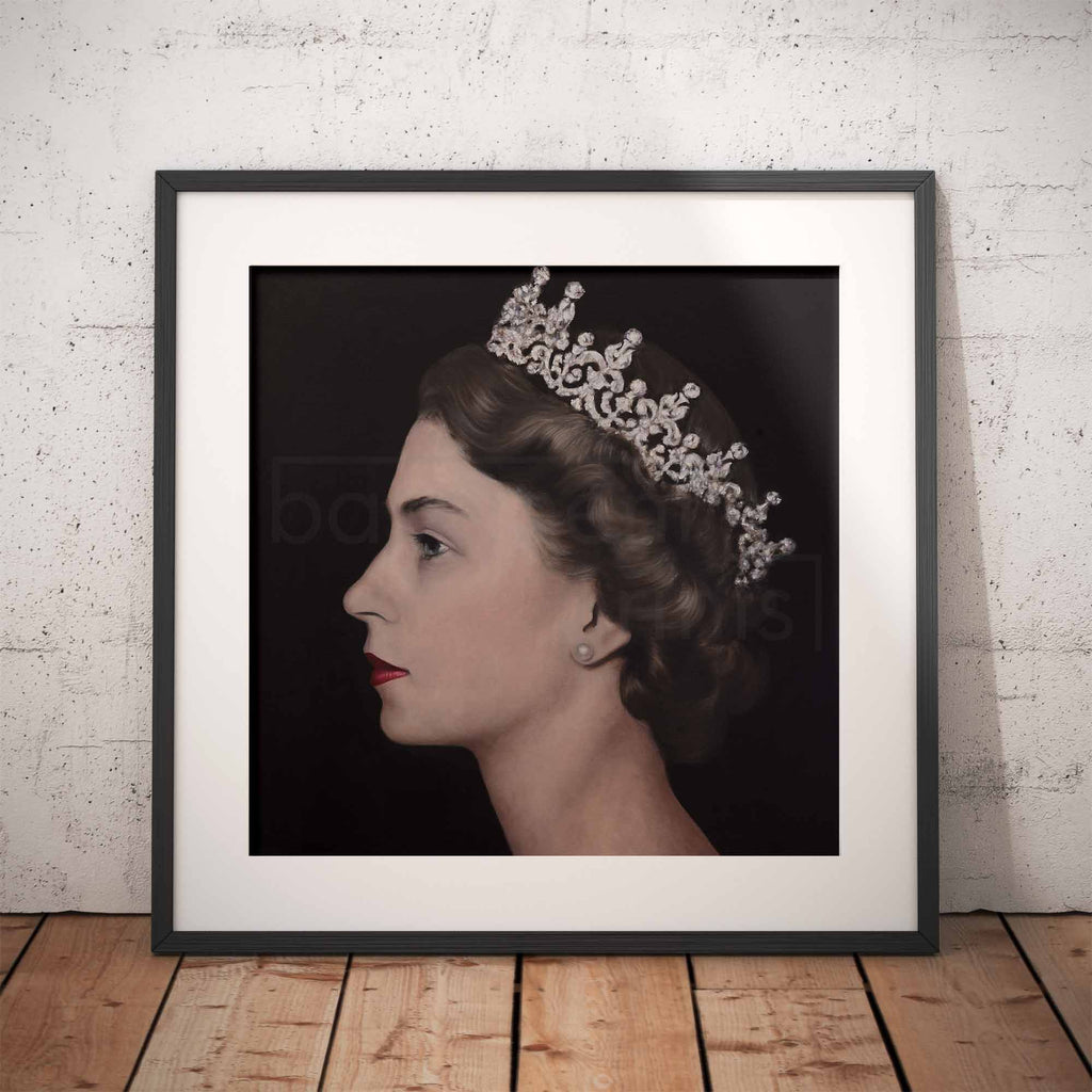 Framed portrait of Queen Elizabeth II wearing a crown against a black background