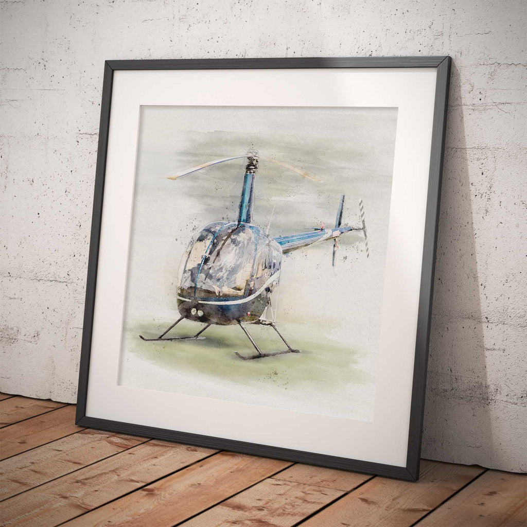 Framed artwork of a Robinson R22 helicopter on a textured wall.