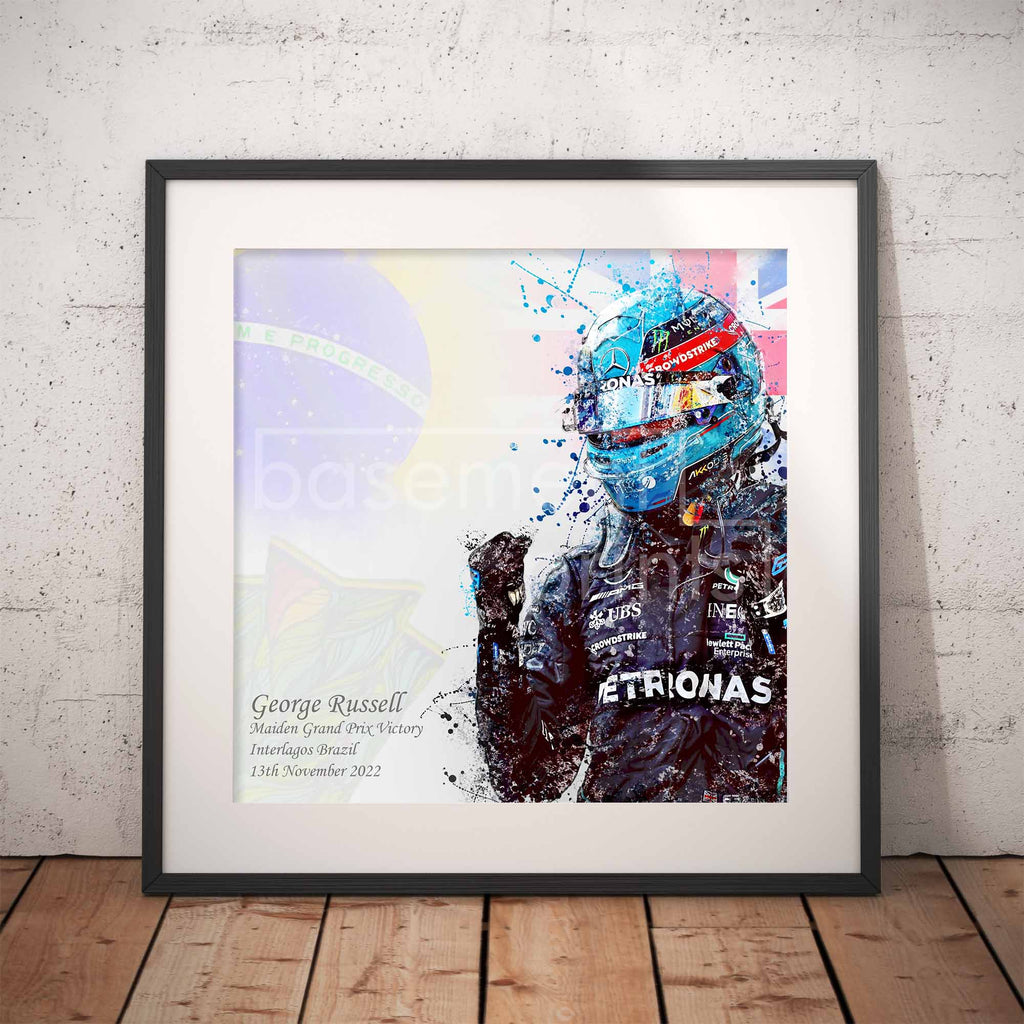 Framed artwork of  George Russell after his first Formula 1 Win on a white wall.