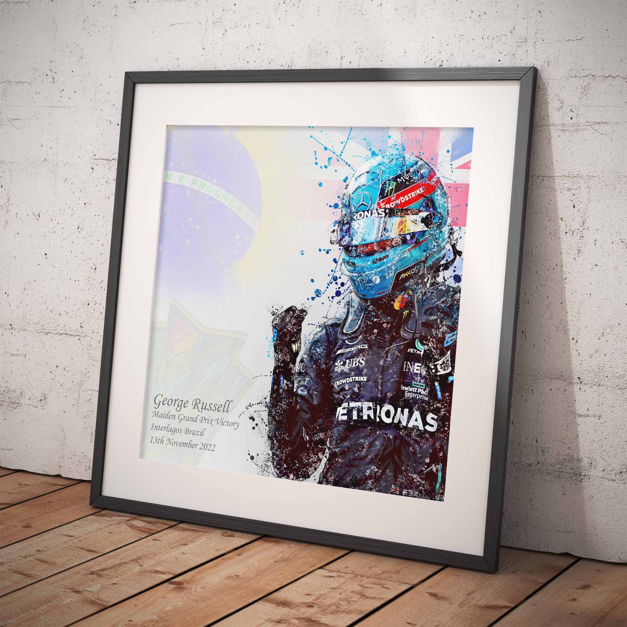 Framed artwork of  George Russell after his first Formula 1 Win against a colorful background on a white wall.