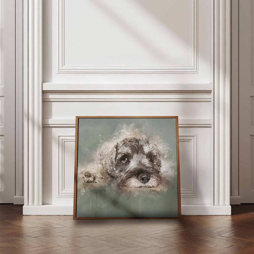 Framed artwork of a Schnauzer dog on a wall in a room with wooden flooring and white walls.