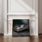 Framed poster of a classic Ford Mustang GT500 car on a wall with wooden floor and white walls.