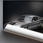 Rolled poster of a Vintage Ford Mustang GT500 car on a dark background with a white border