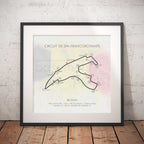 Framed poster of Circuit de Spa-Francorchamps layout on a brick wall background

