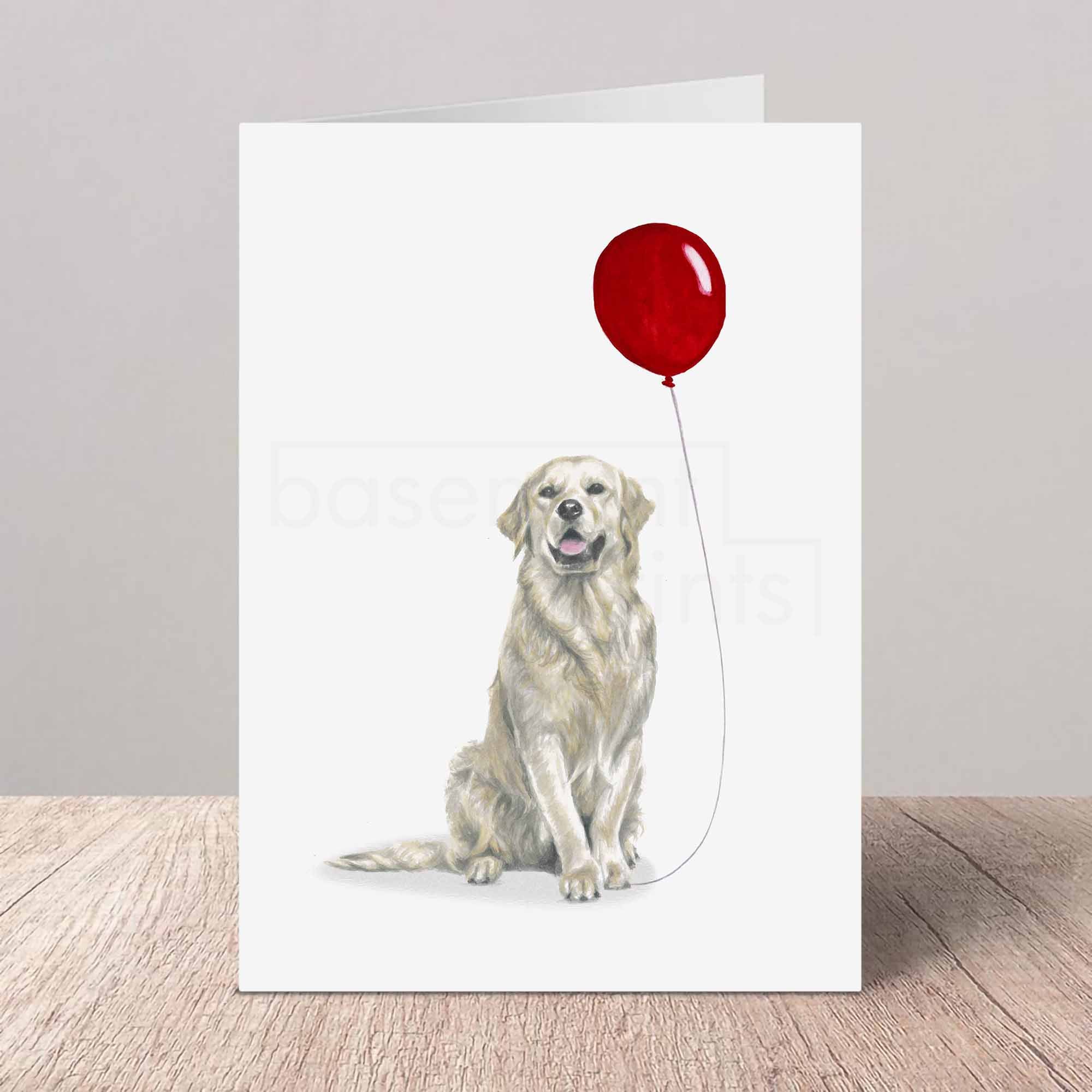Greeting card with a yellow Labrador holding a red balloon on a white background